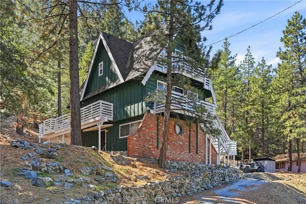 front view of a house with a trees