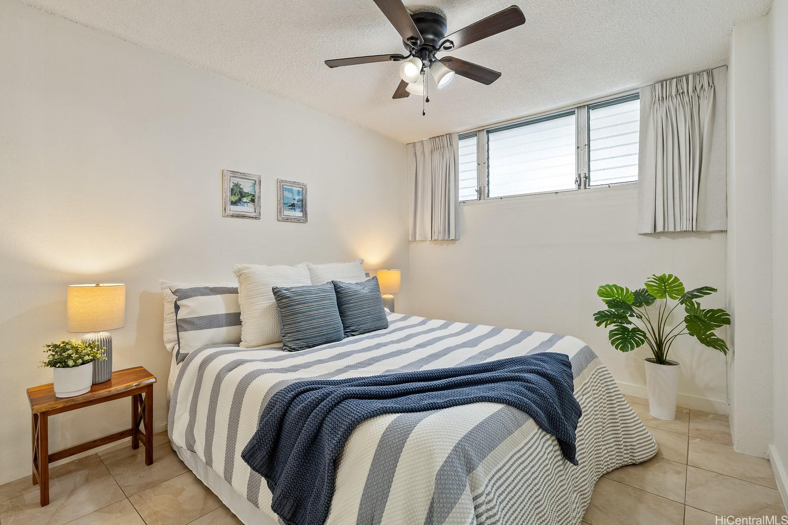 620 McCully Street, Unit 703 Honolulu, HI 96826 - Photo 13 of 25 Bedroom across from the bathroom