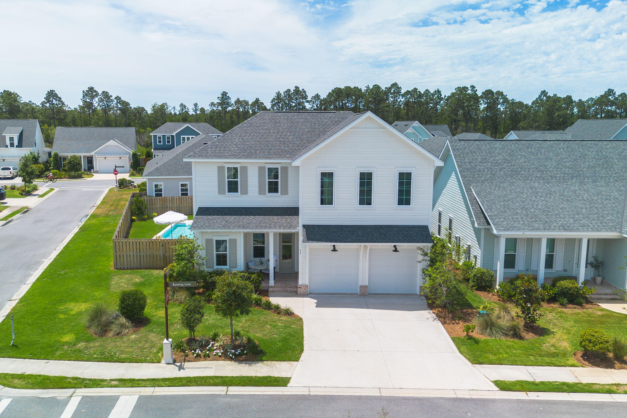 11 Bunting Ln Inlet Beach Inlet Beach, FL 32461 - Photo 6 of 70 a front view of a house with a yard