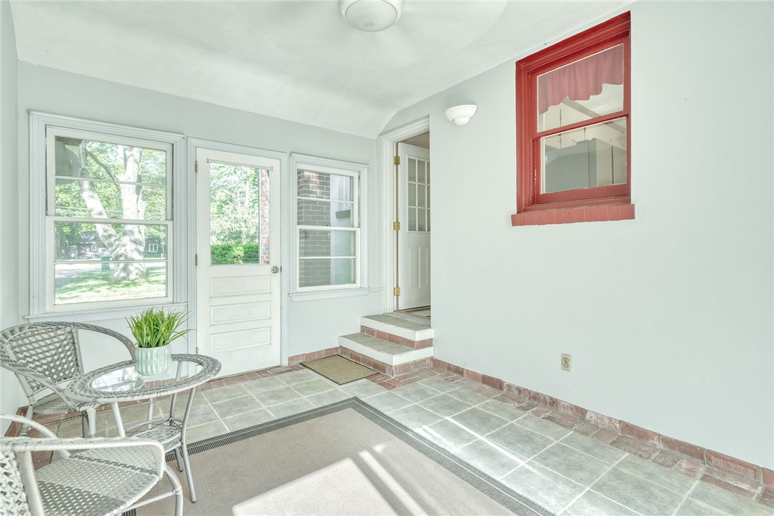 606 Bay Road Webster, NY 14580 - Photo 18 of 49 Breezeway/sunroom adjoining the kitchen, kitchen,
