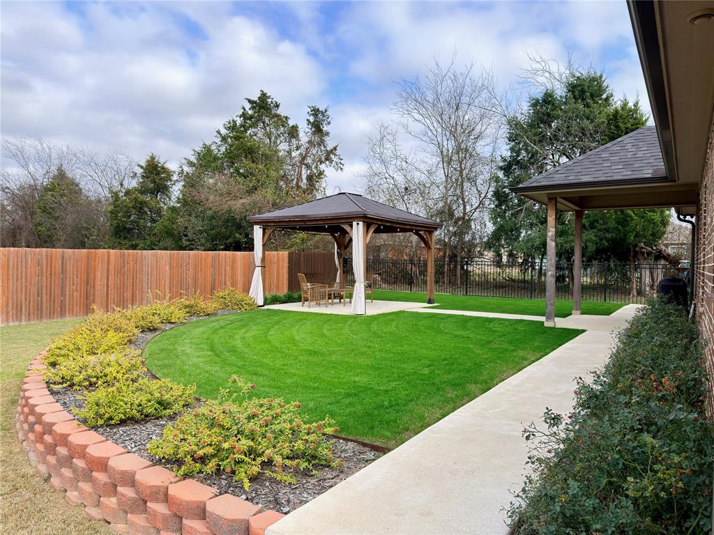 2232 Samuel Street Mabank, TX 75147 - Photo 27 of 36 a view of a garden with a slide