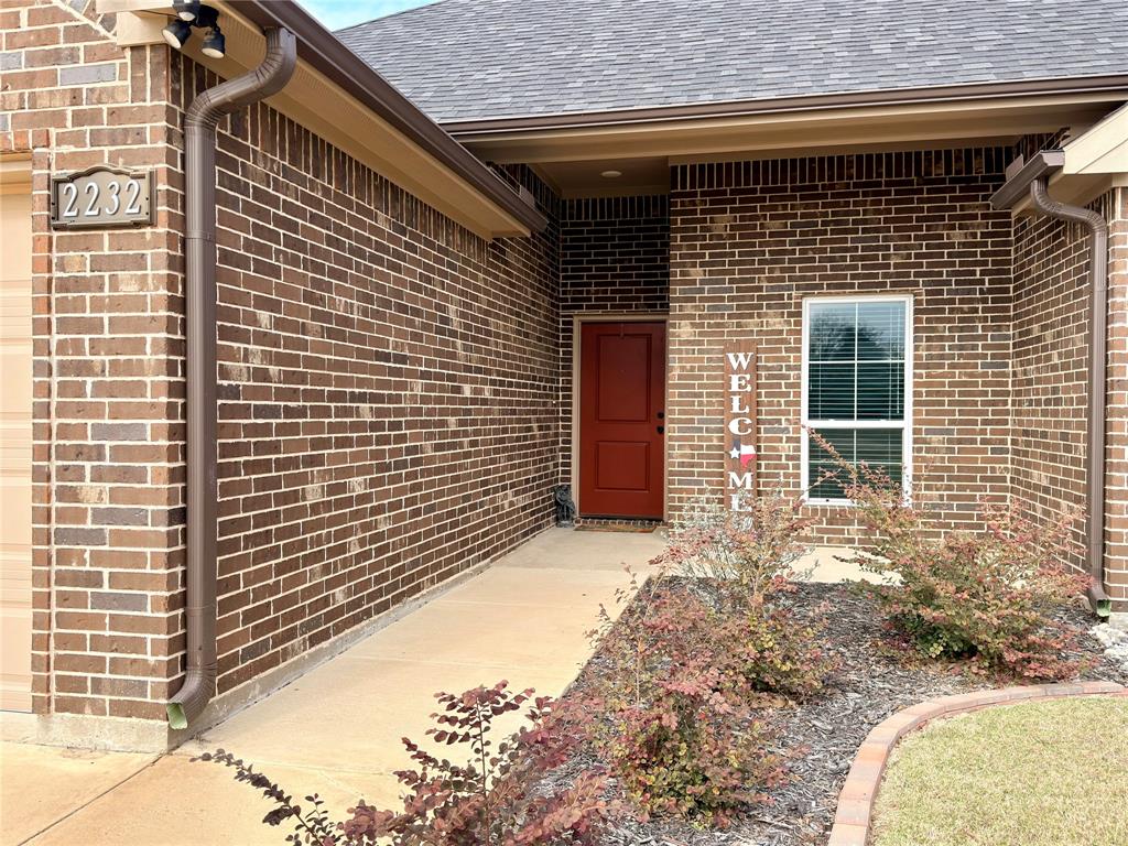 2232 Samuel Street Mabank, TX 75147 - Photo 4 of 36 a front view of a house