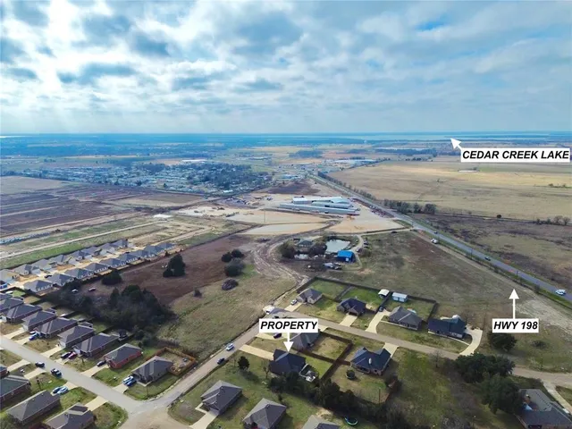 a view of a parking area with an outdoor space