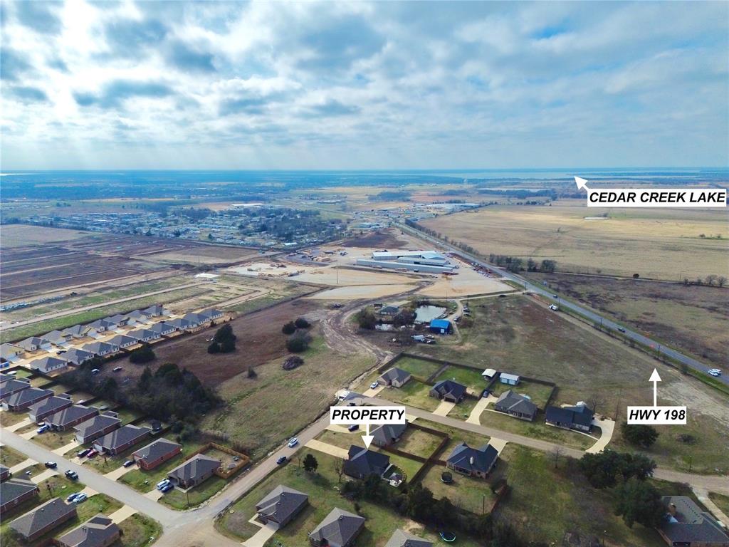2232 Samuel Street Mabank, TX 75147 - Photo 5 of 36 a view of a parking area with an outdoor space