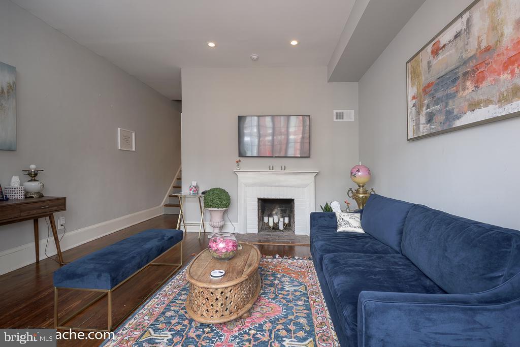 106 7th Street Southeast Washington, DC 20003 - Photo 2 of 15 Chic living space with modern elegance.