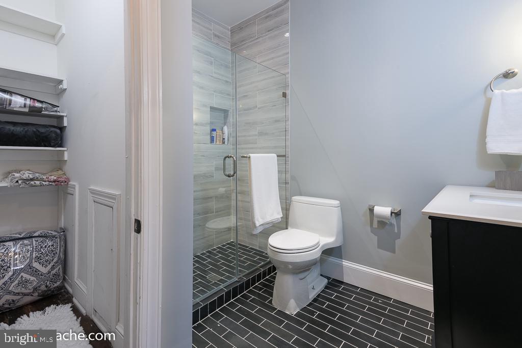 106 7th Street Southeast Washington, DC 20003 - Photo 7 of 15 Renovated en-suite bathroom and walk-in closet