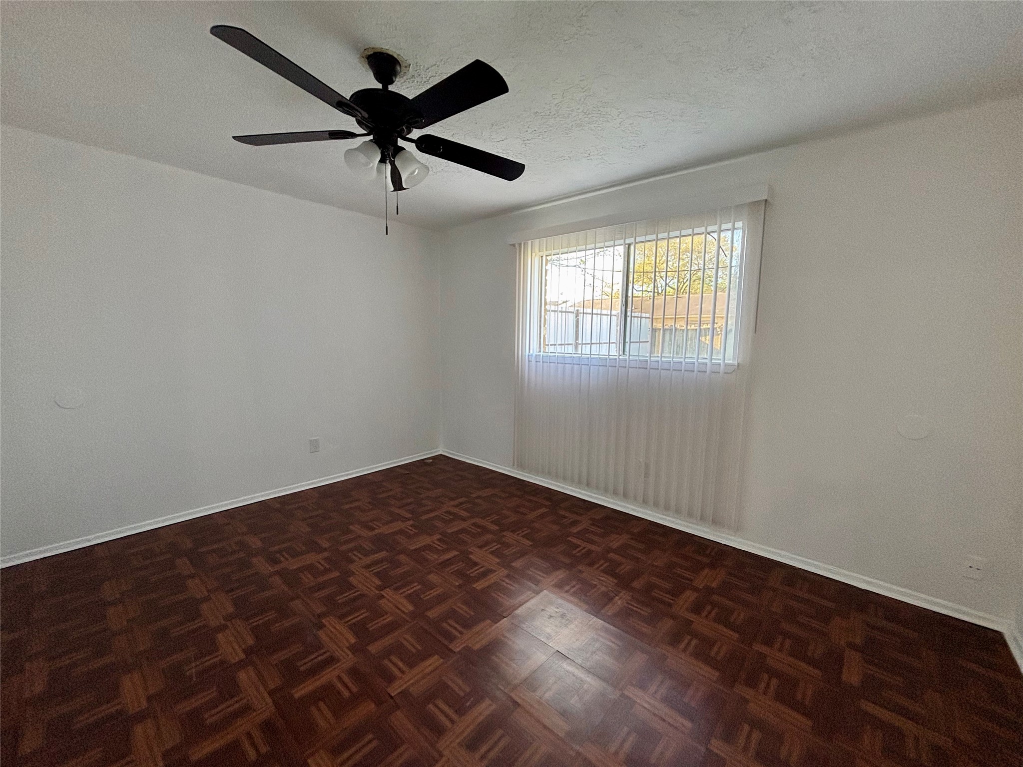 4903 Raven Ridge Drive Houston, TX 77053 - Photo 16 of 20 wooden floor in an empty room with a window
