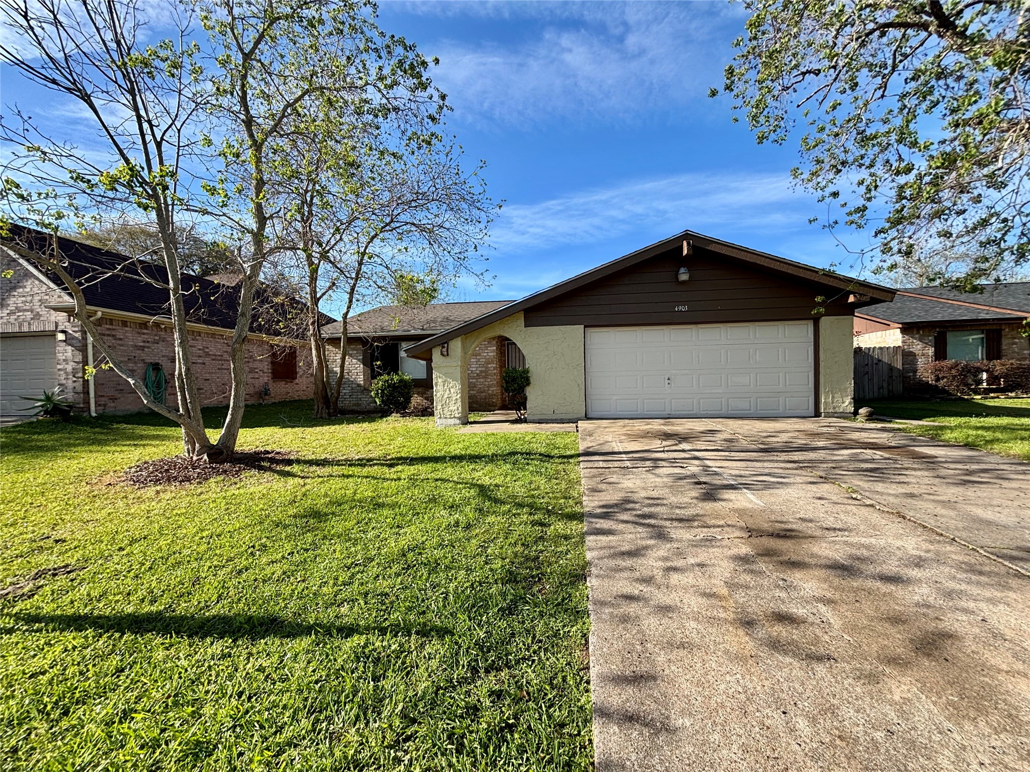 4903 Raven Ridge Drive Houston, TX 77053 - Photo 17 of 20 a front view of a house with a yard