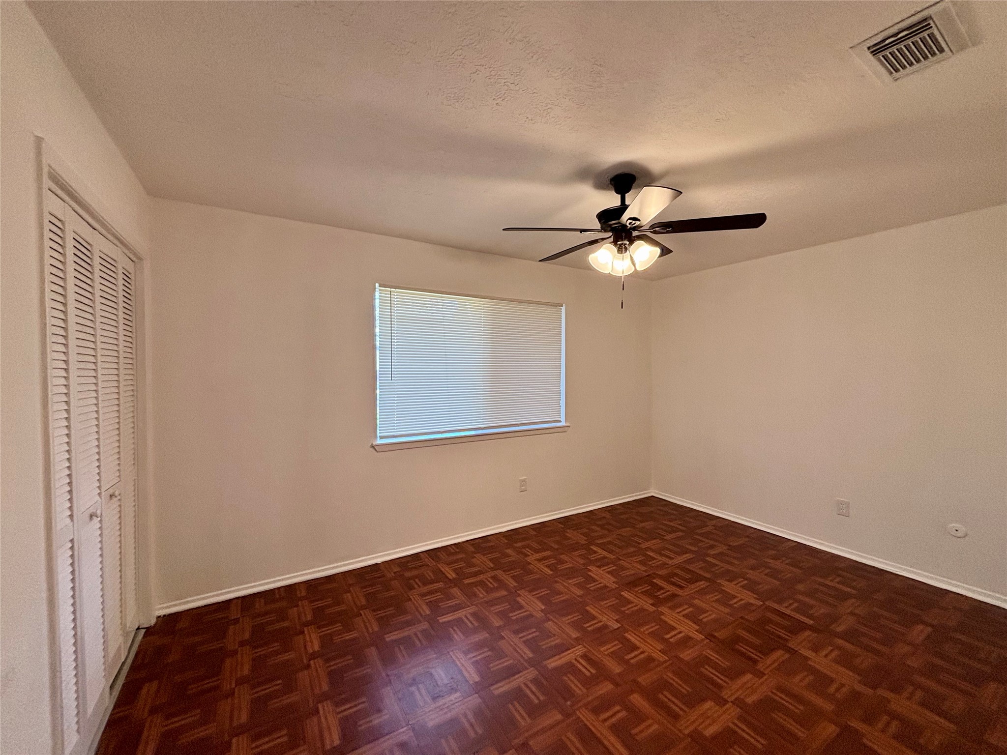 4903 Raven Ridge Drive Houston, TX 77053 - Photo 9 of 20 a view of a room with a ceiling fan