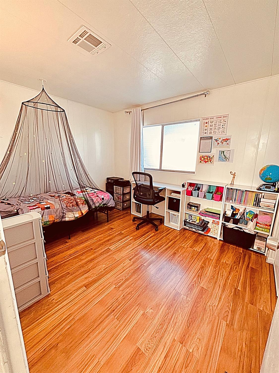 260 West Comet Road Gustine, CA 95322 - Photo 10 of 17 a living room with furniture and a wooden floor