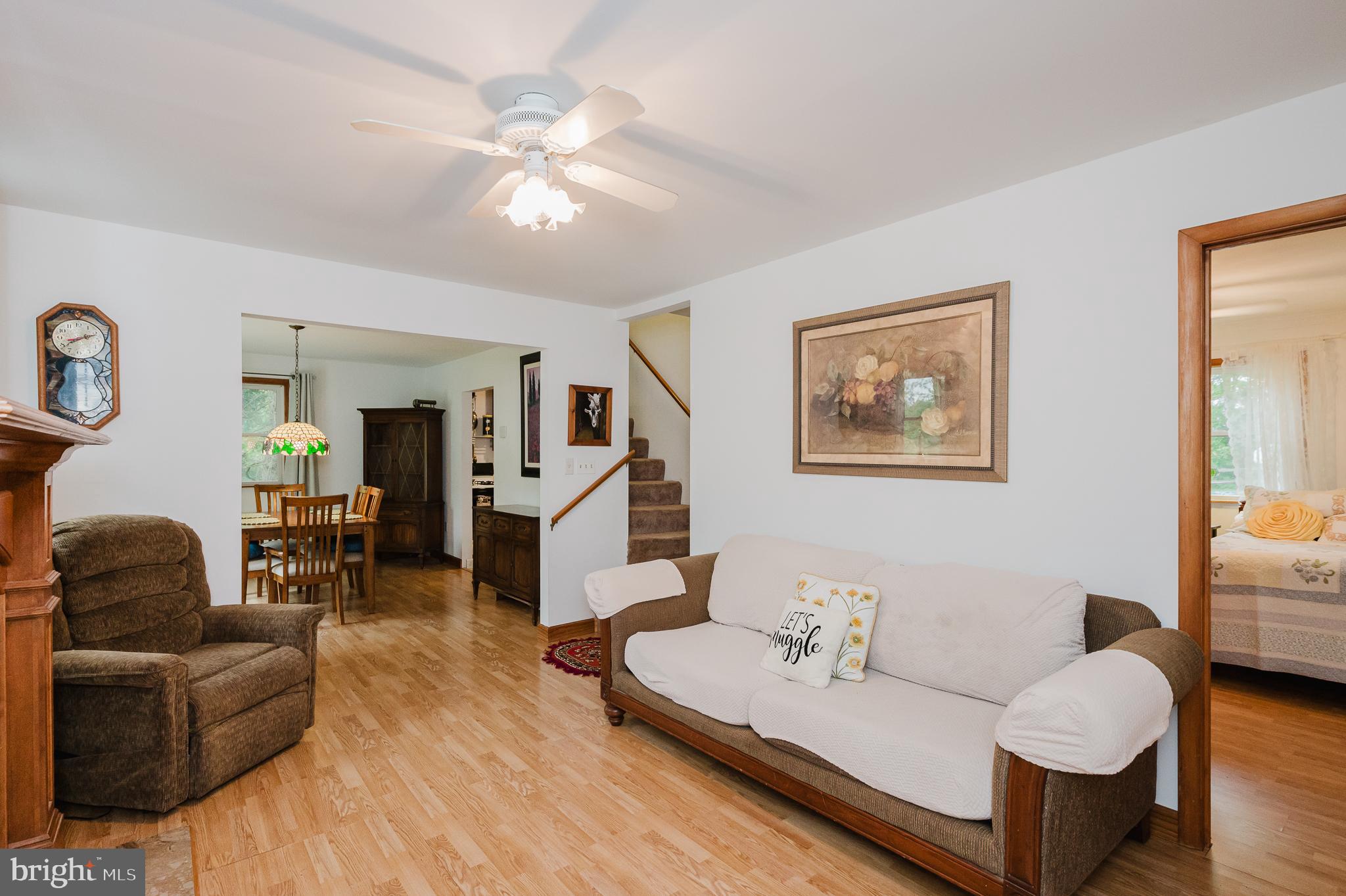 710 Magnolia Road Joppa, MD 21085 - Photo 4 of 58 a living room with furniture and wooden floor