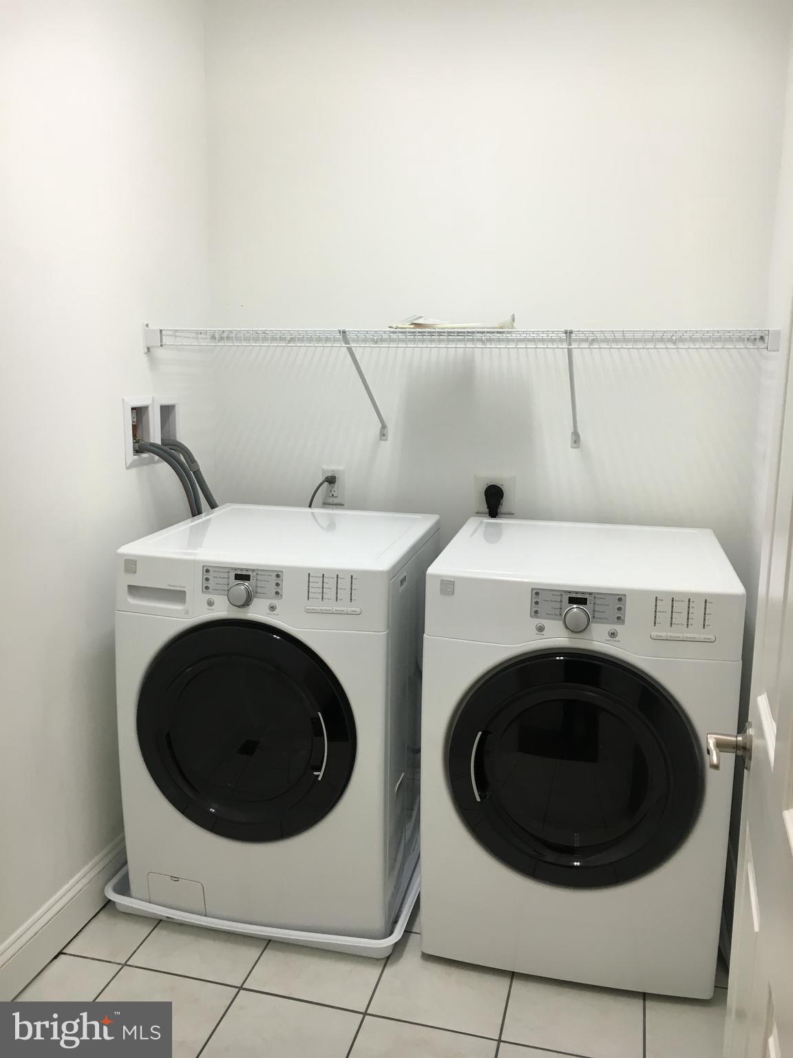 22 North George Street, Unit 1 York, PA 17401 - Photo 9 of 12 a utility room with dryer and washer