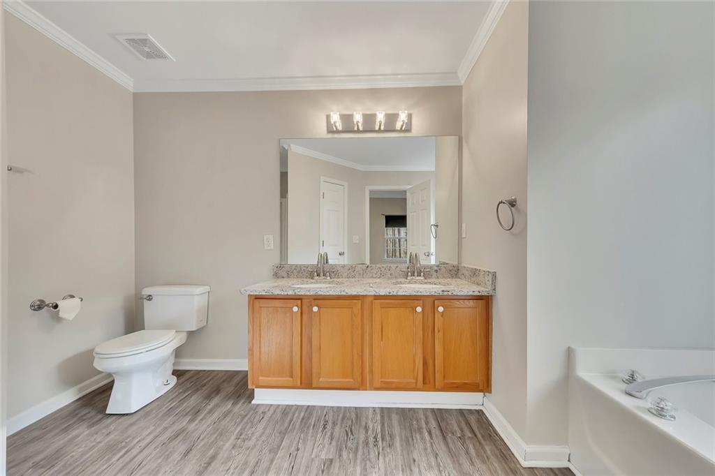 6326 Autumn View Way Northwest Acworth, GA 30101 - Photo 18 of 37 a bathroom with a sink and a mirror