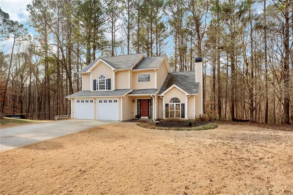 6326 Autumn View Way Northwest Acworth, GA 30101 - Photo 2 of 37 front view of a house with a yard