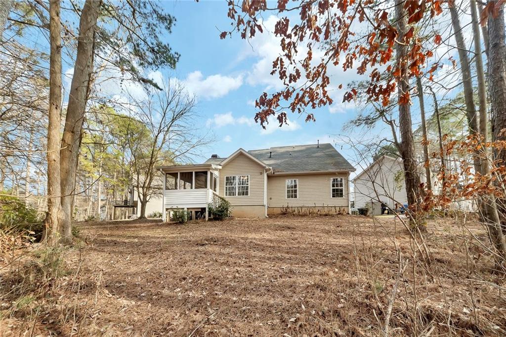 6326 Autumn View Way Northwest Acworth, GA 30101 - Photo 32 of 37 a white house that has a tree in front of it