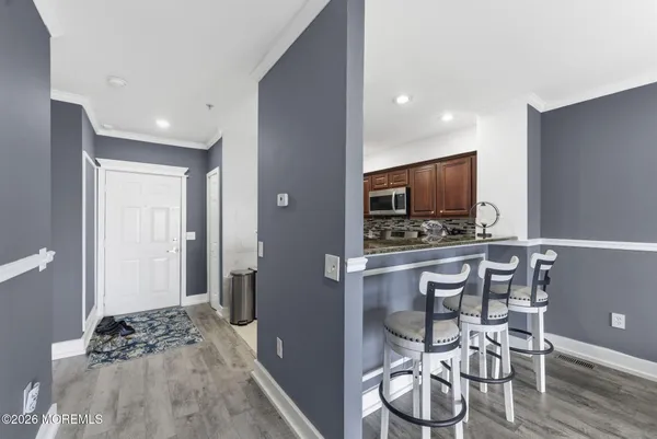 a view of a kitchen and dining room
