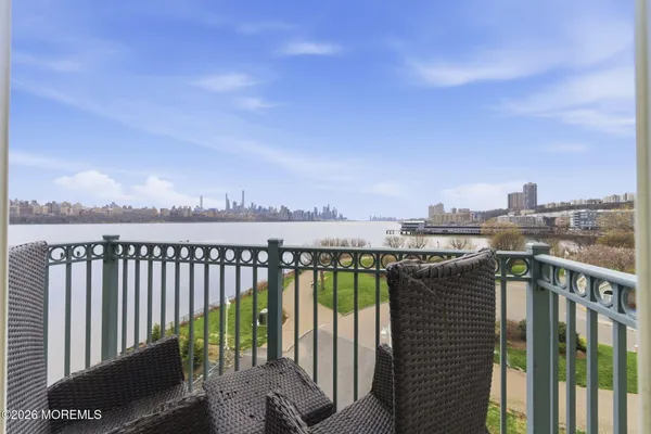 a balcony with a city view