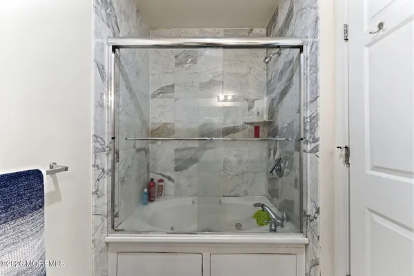 a bathroom with a bathtub
