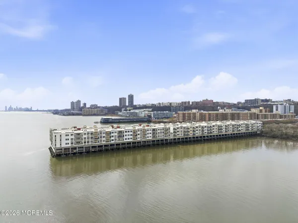 a view of a city with a lake view