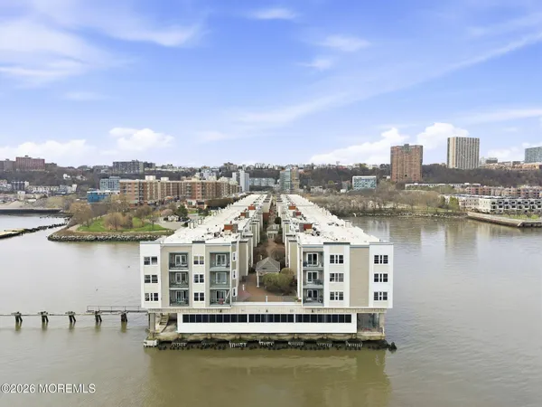 a view of a lake with a city