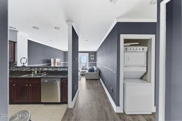 a kitchen with a stove and a refrigerator