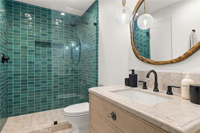 a bedroom with a bed and a walk in closet