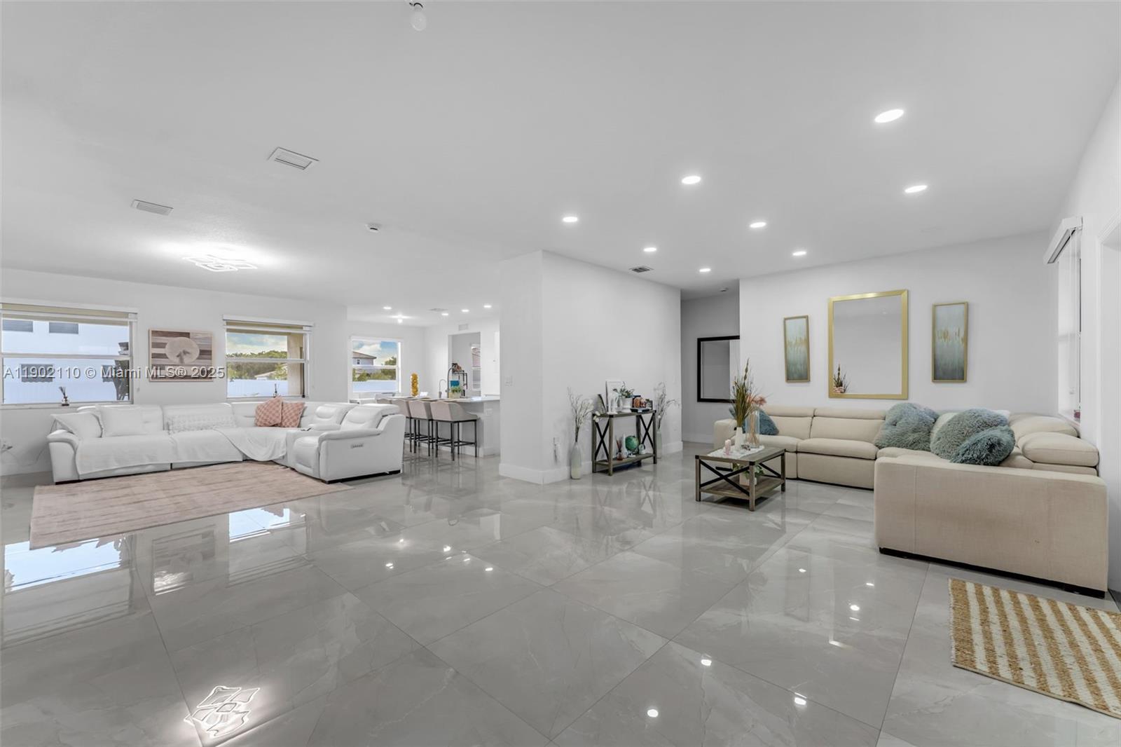 19866 Southwest 320th Street Homestead, FL 33030 - Photo 6 of 55 a living room with furniture and a couch