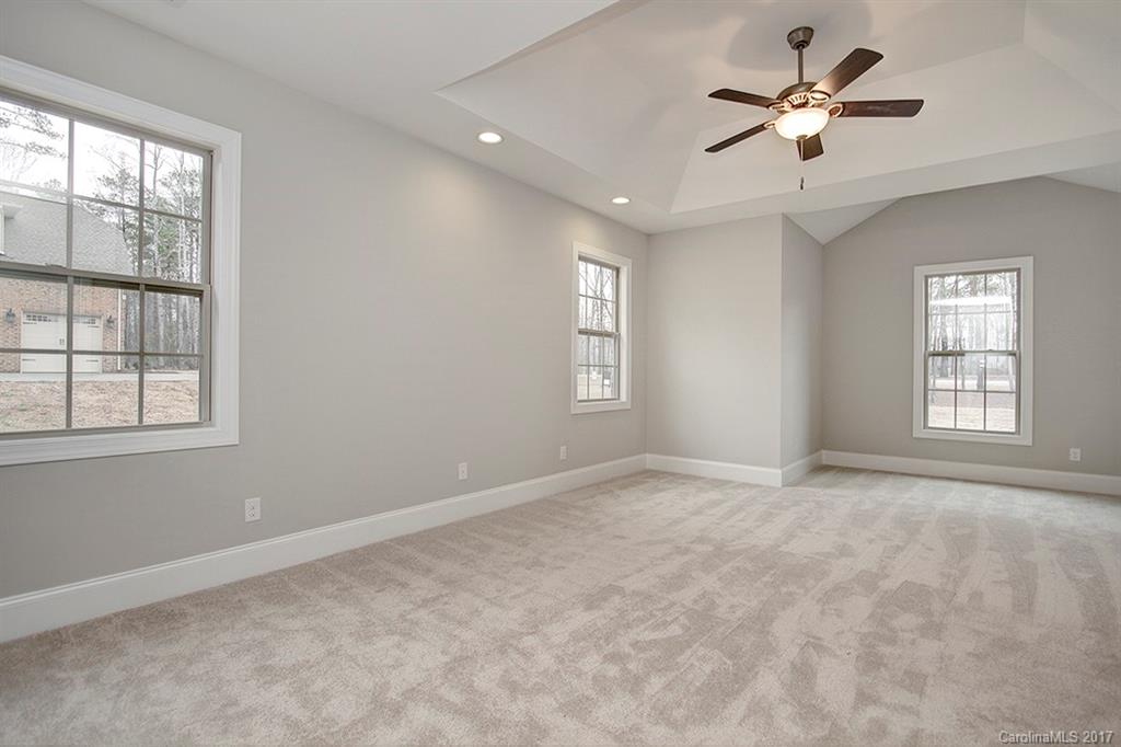 4933 River Oaks Road, Unit 113 Clover, SC 29710 - Photo 14 of 24 a view of an empty room with a window