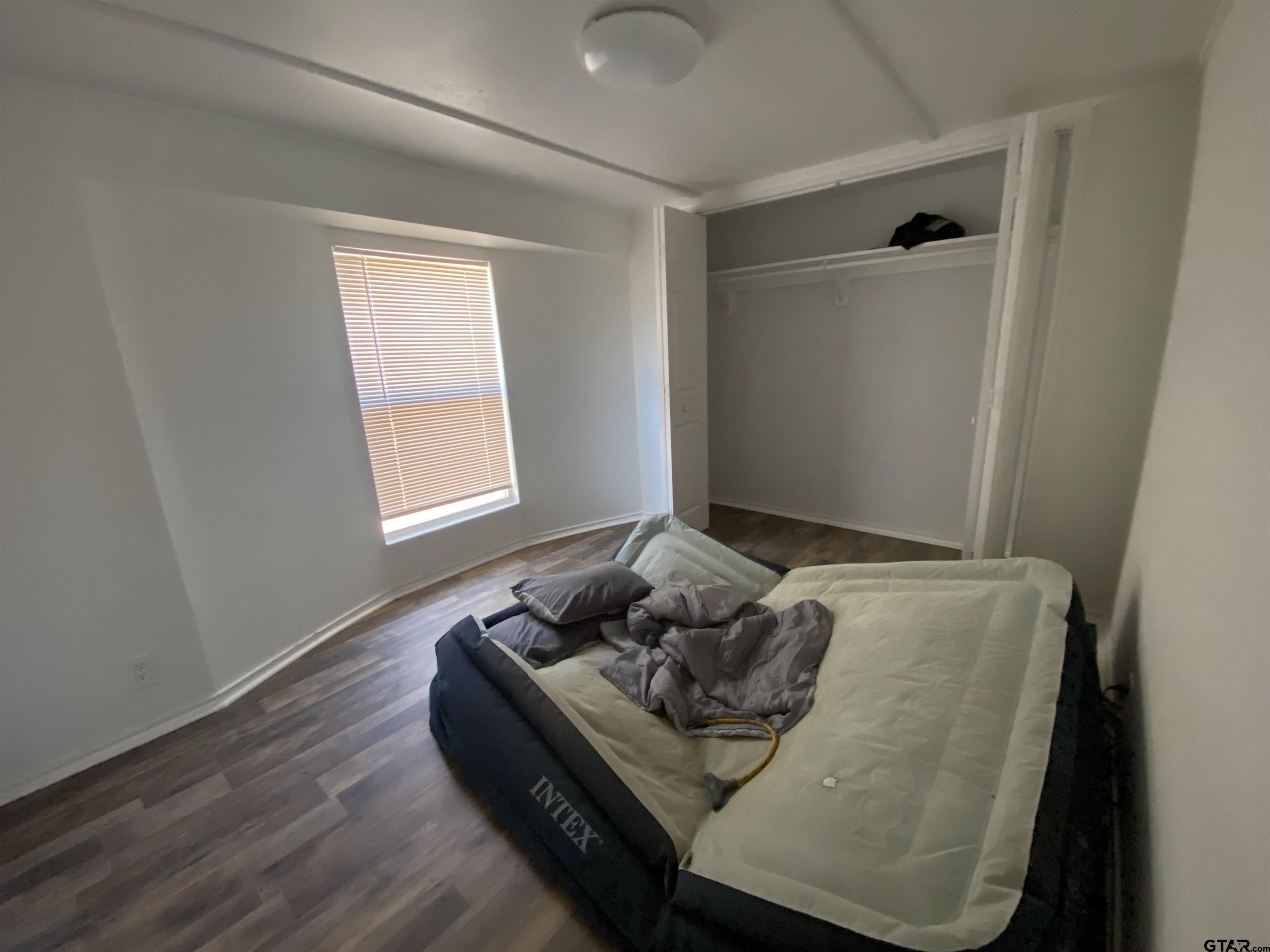 7761 Fm 1251 Henderson, TX 75652 - Photo 24 of 29 a living room with furniture and a window