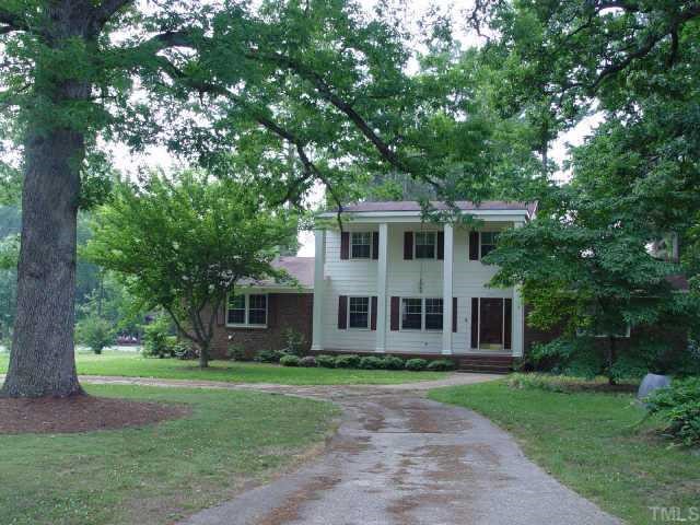 6100 Vicky Drive Raleigh, NC 27603 - Photo 1 of 1 Beautifully landscaped yard with circle drive.