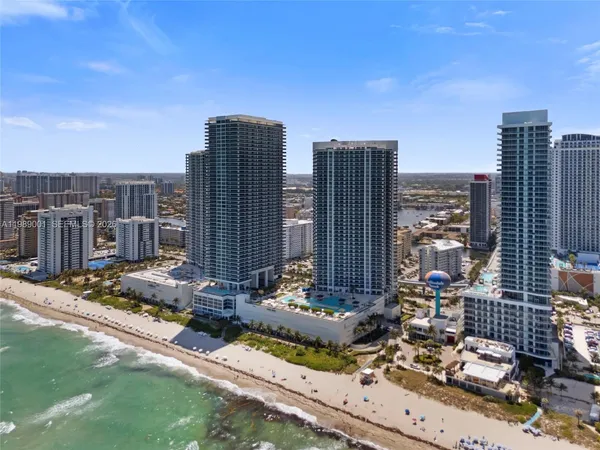 a view of a city with tall buildings