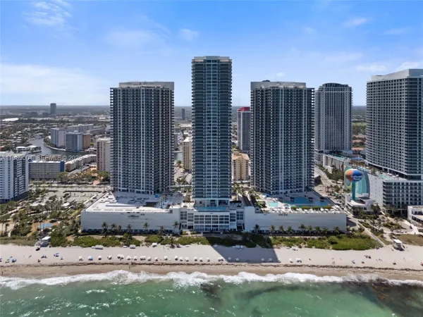 a view of a city with tall buildings