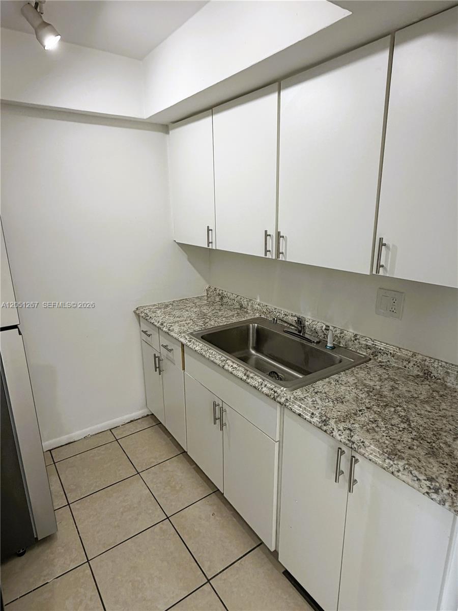 7340 Southwest 82nd Street, Unit C205 Miami, FL 33143 - Photo 3 of 18