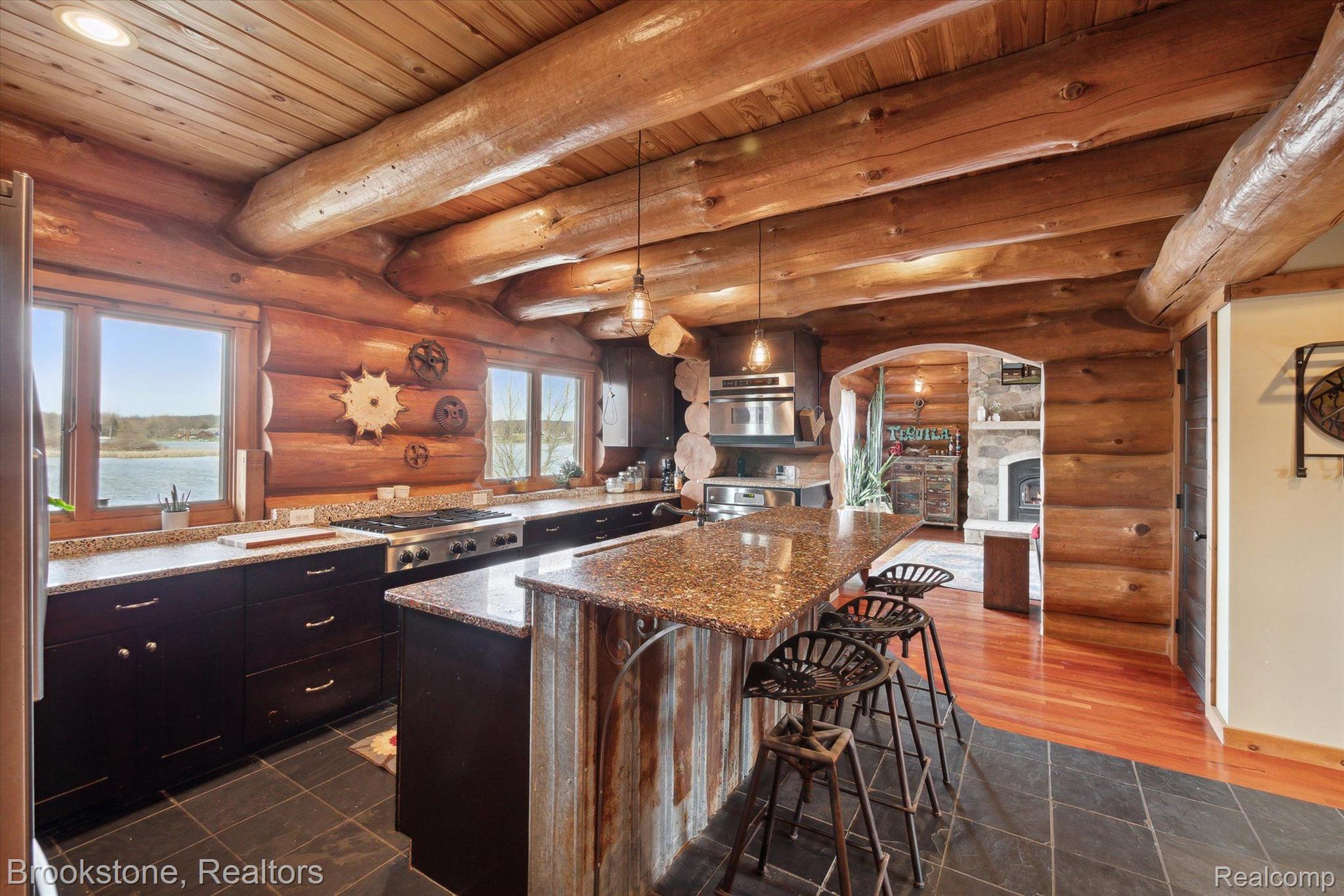 8695 Ellis Road Clarkston, MI 48348 - Photo 13 of 69 Spacious U-shaped kitchen w/ bar for casual meals