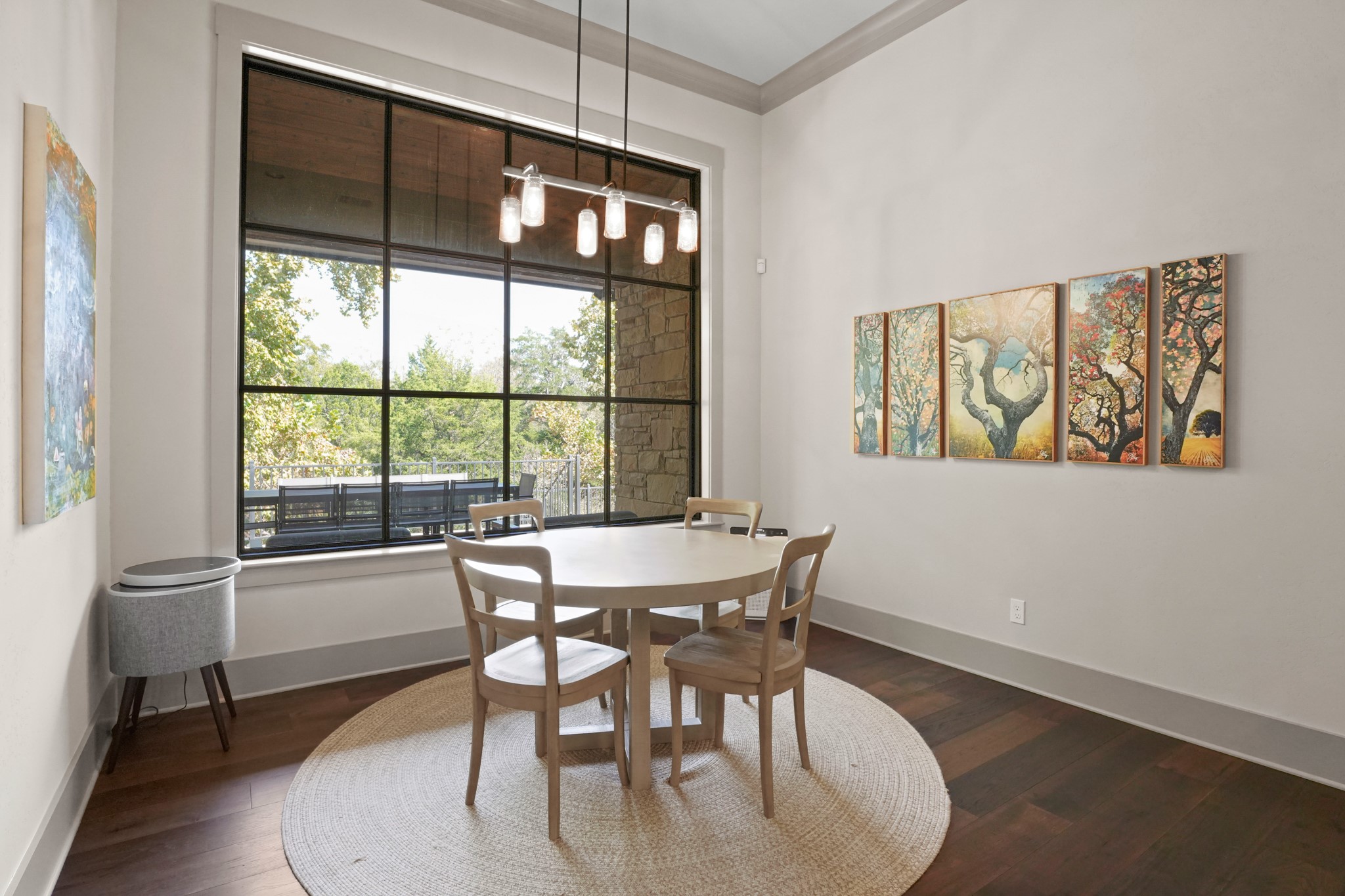 2753 Springwood Lane Georgetown, TX 78628 - Photo 11 of 40 a dining room with furniture a chandelier and wooden floor