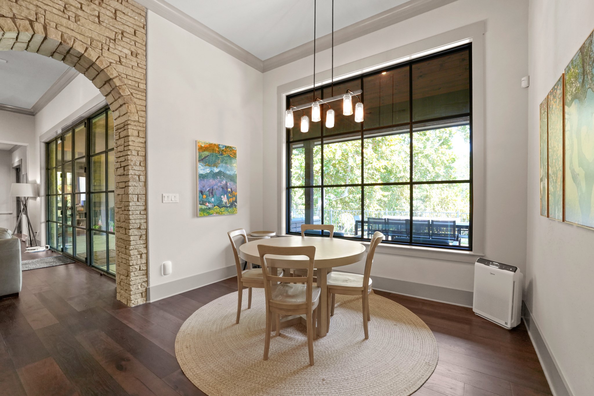 2753 Springwood Lane Georgetown, TX 78628 - Photo 12 of 40 a dining room with furniture a chandelier and wooden floor