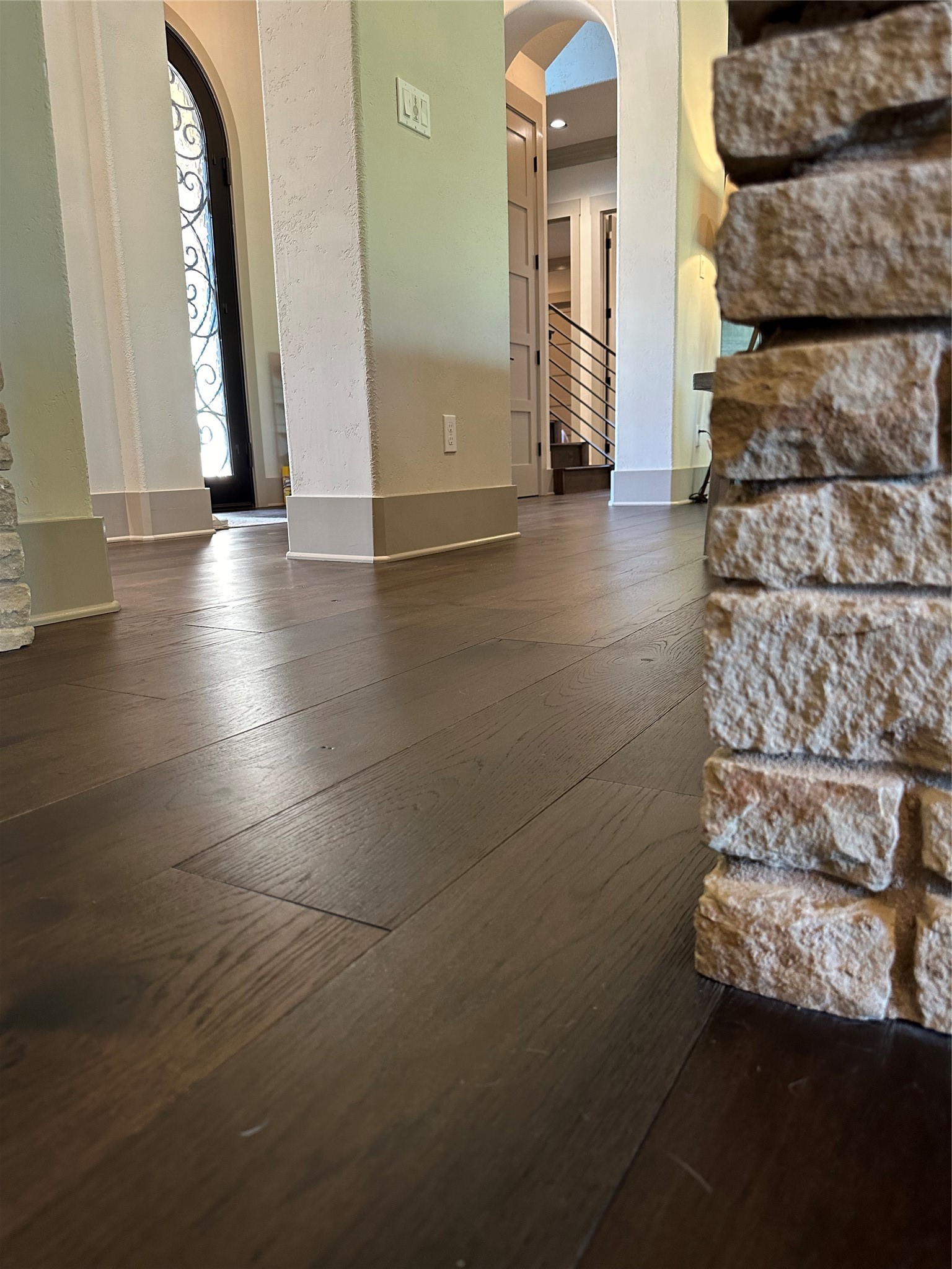 2753 Springwood Lane Georgetown, TX 78628 - Photo 14 of 40 a view of a hallway with wooden floor and furniture