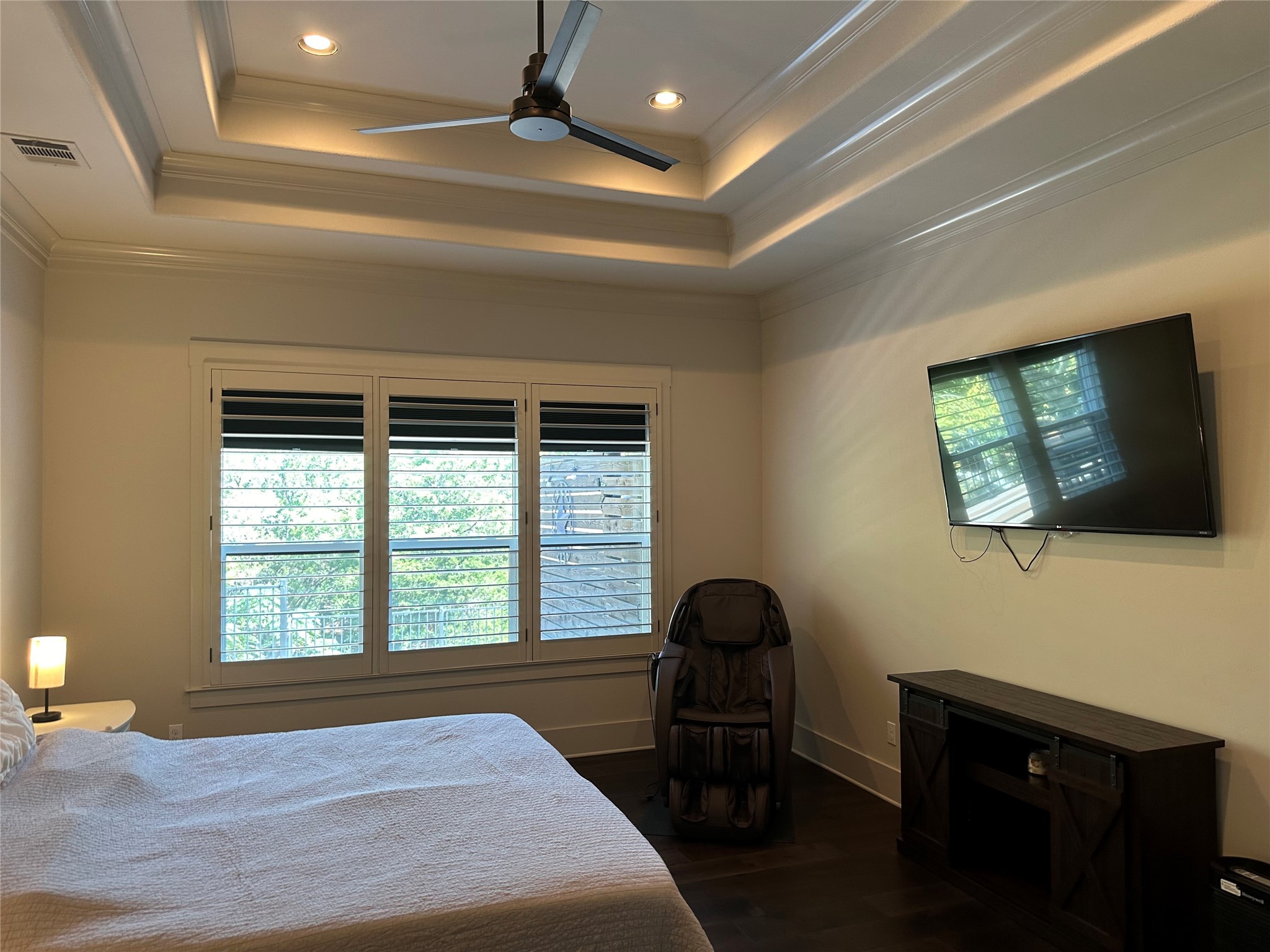 2753 Springwood Lane Georgetown, TX 78628 - Photo 17 of 40 a bedroom with a bed and a flat screen tv