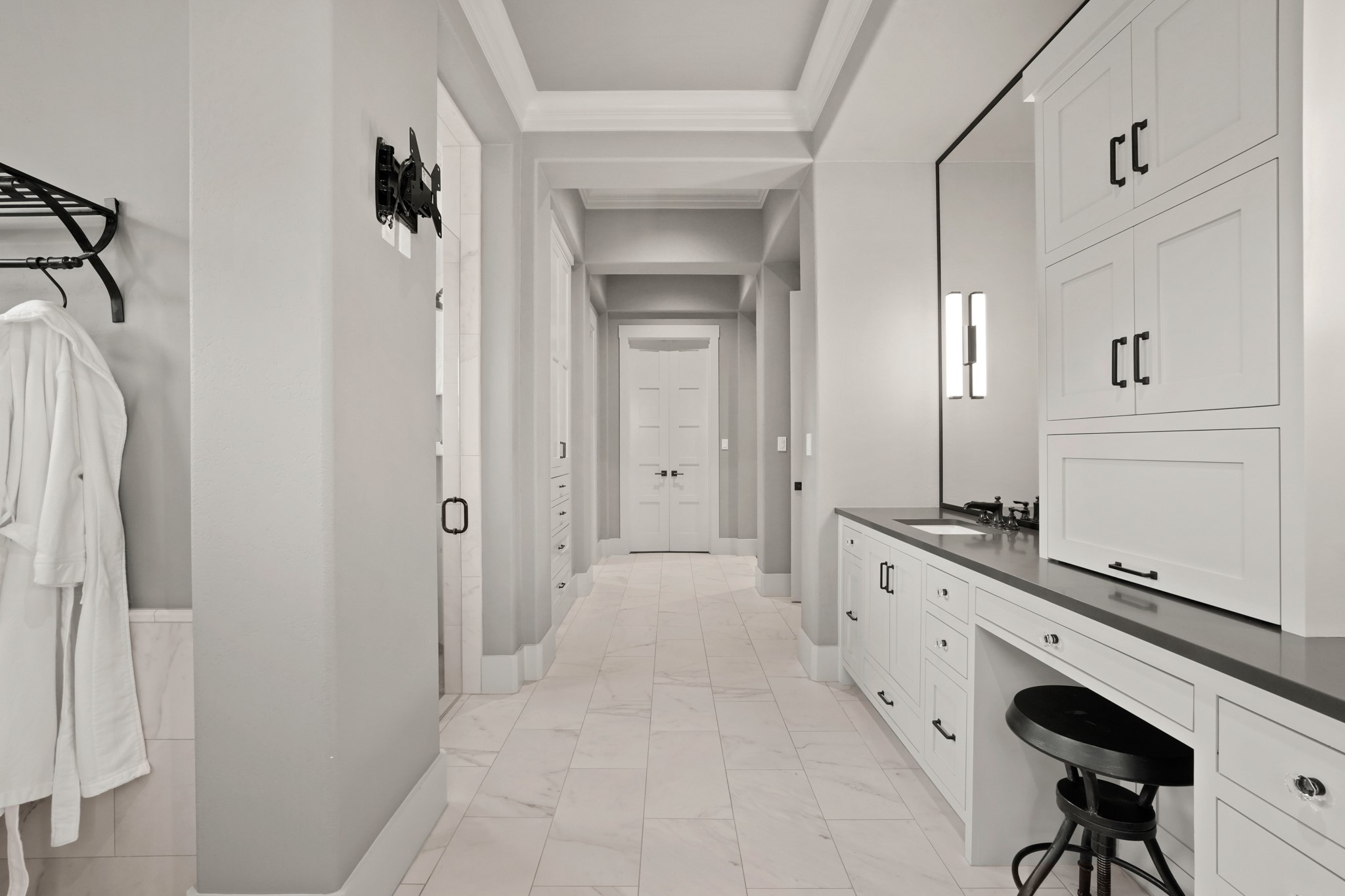 2753 Springwood Lane Georgetown, TX 78628 - Photo 21 of 40 a hall with a sink and a refrigerator