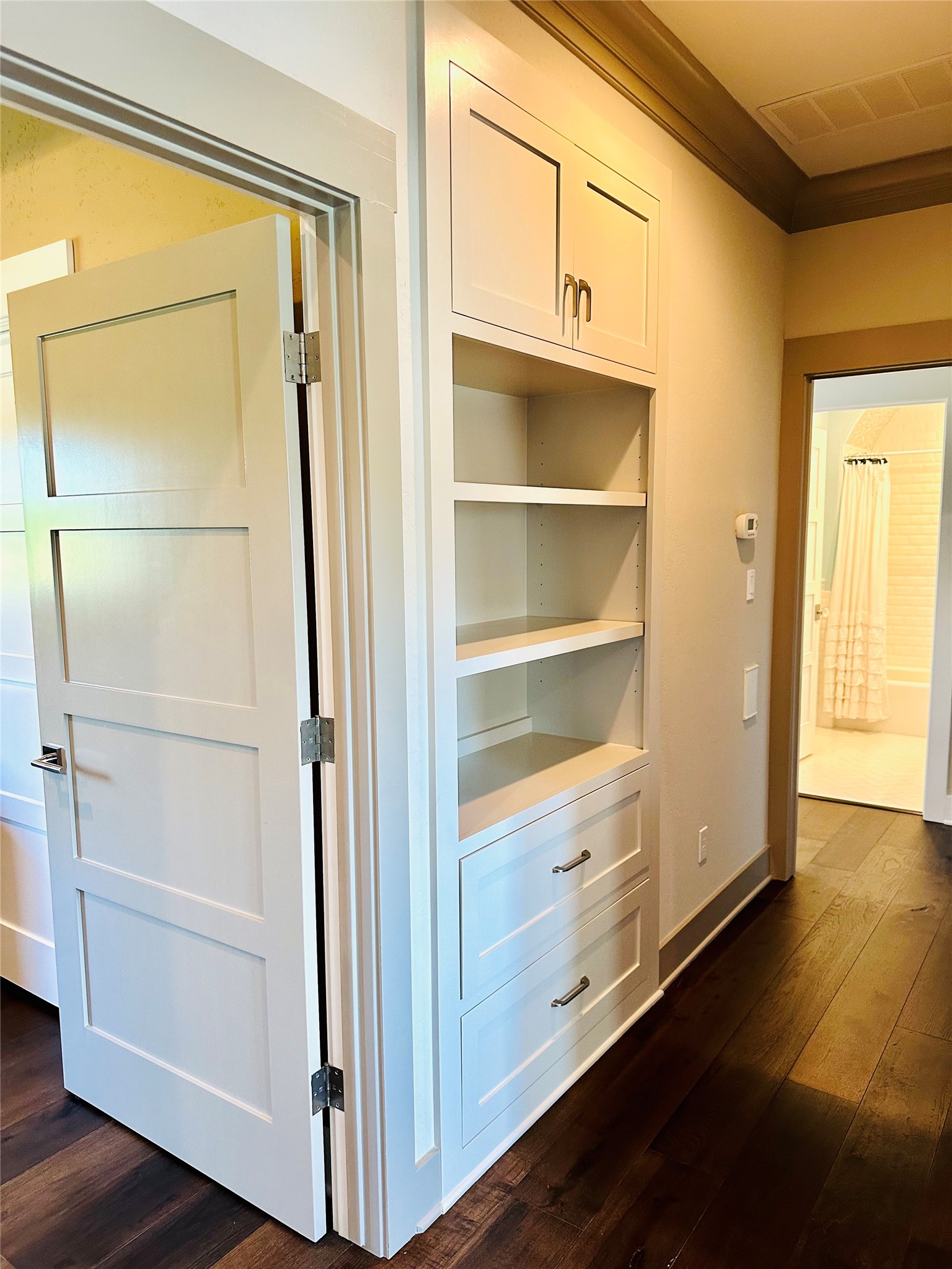 2753 Springwood Lane Georgetown, TX 78628 - Photo 32 of 40 a view of walk in closet with empty racks