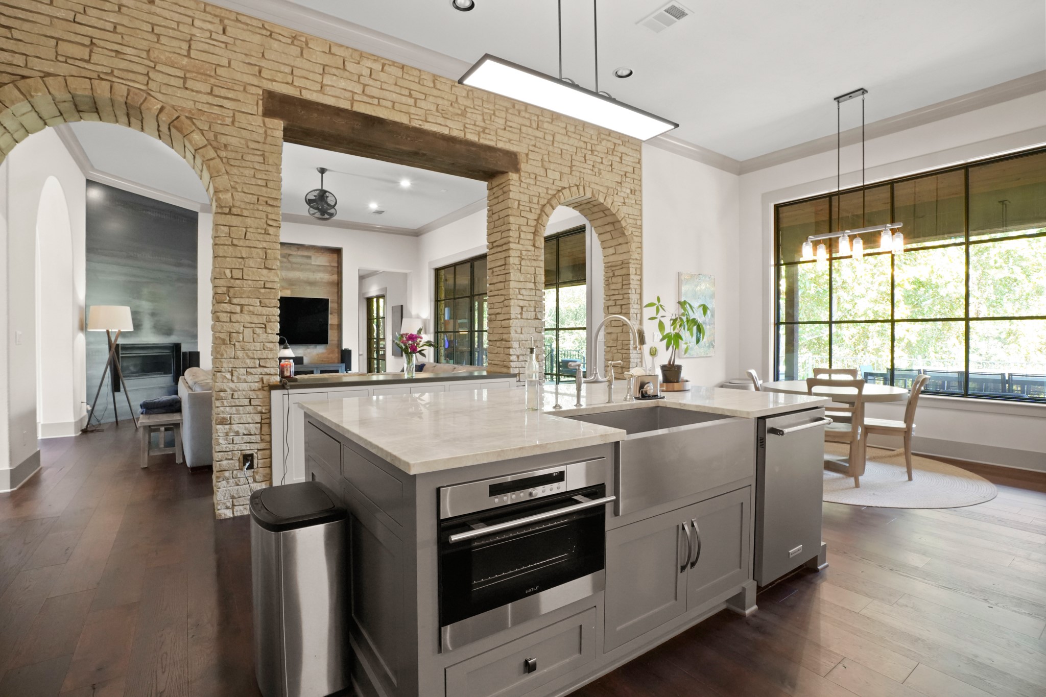 2753 Springwood Lane Georgetown, TX 78628 - Photo 8 of 40 a kitchen with stainless steel appliances granite countertop a stove and a wooden floor