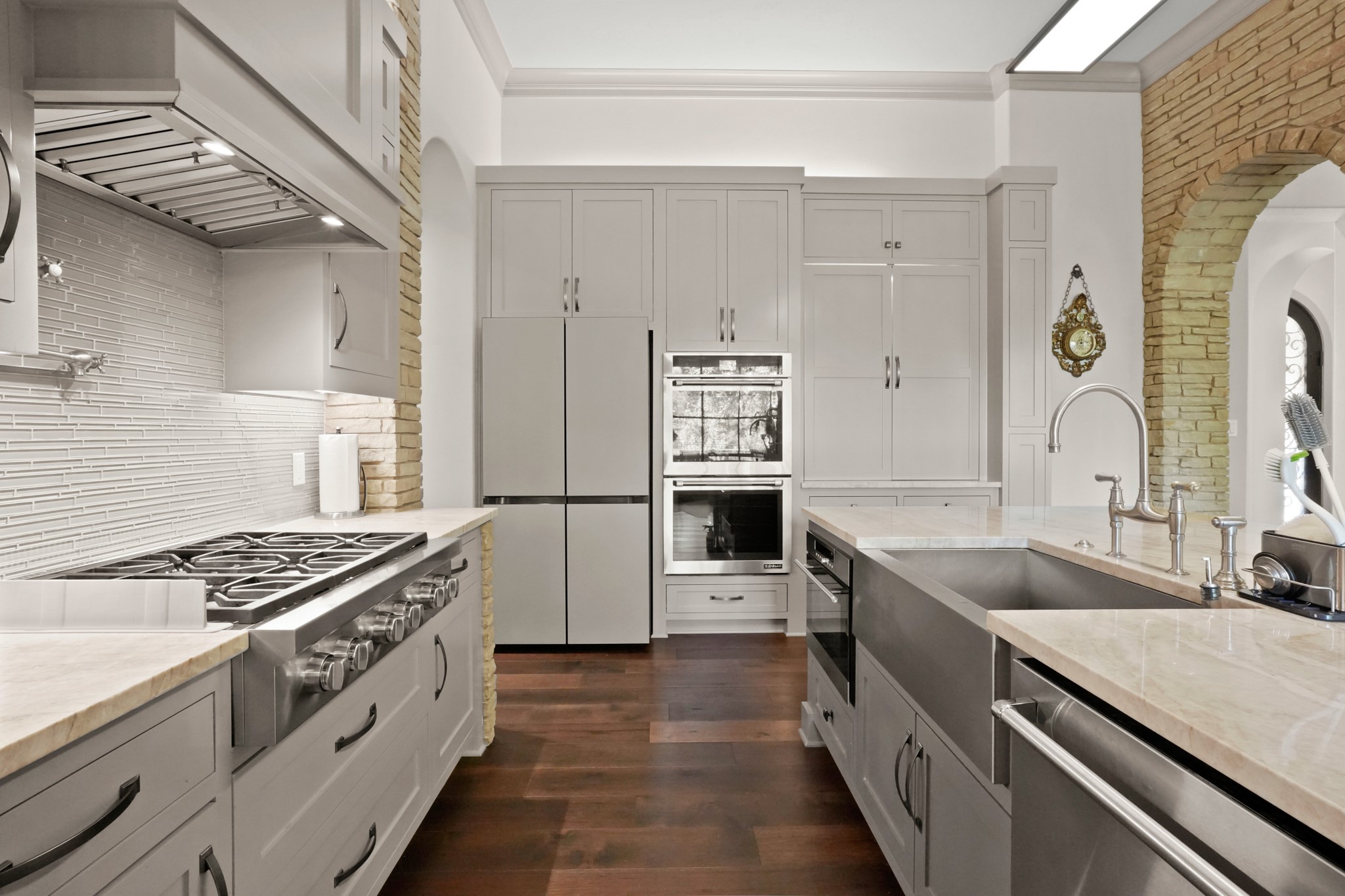 2753 Springwood Lane Georgetown, TX 78628 - Photo 9 of 40 a kitchen with stainless steel appliances granite countertop a sink stove and refrigerator