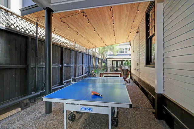 a living room with furniture fireplace and a flat screen tv