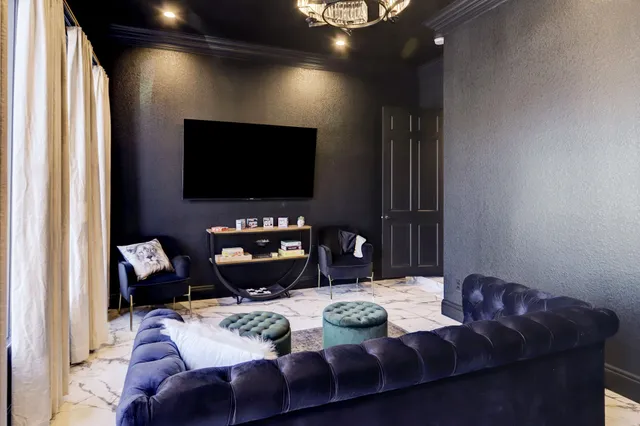 a view of a house with backyard and porch