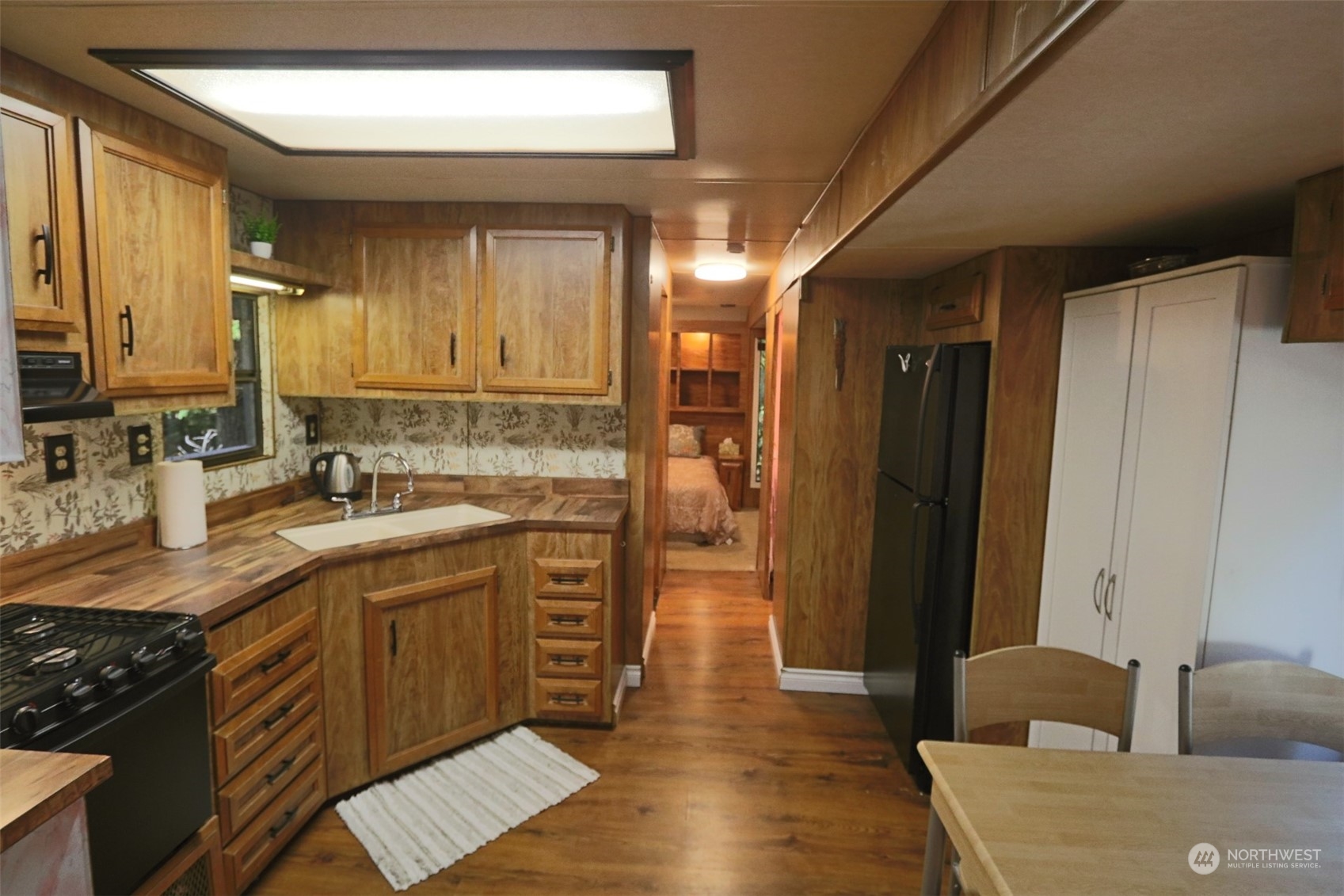 18 Drial Loop Maple Falls, WA 98266 - Photo 15 of 39 a spacious bathroom with a granite countertop sink a mirror and a bathtub