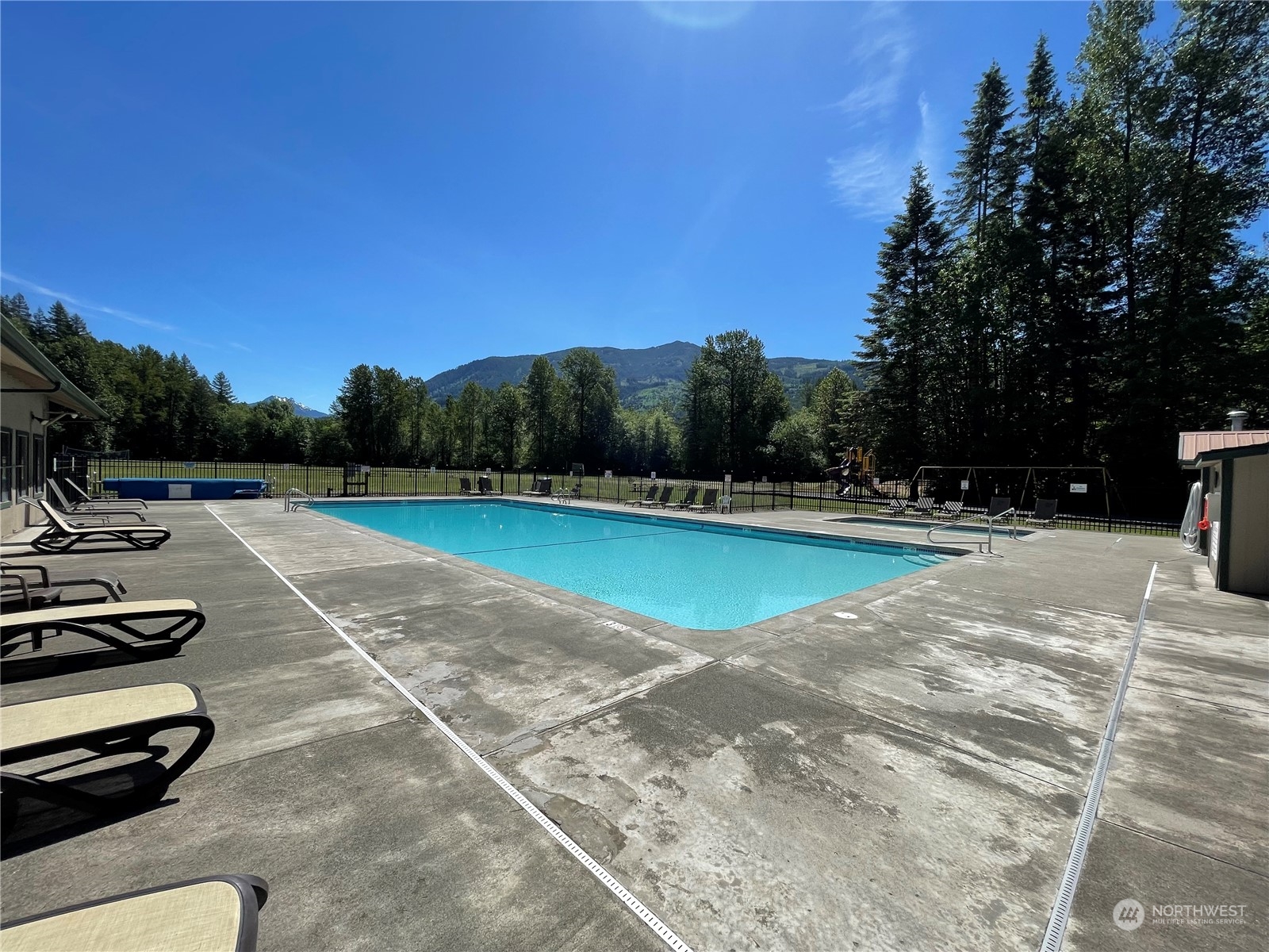 18 Drial Loop Maple Falls, WA 98266 - Photo 34 of 39 a view of a swimming pool with a yard