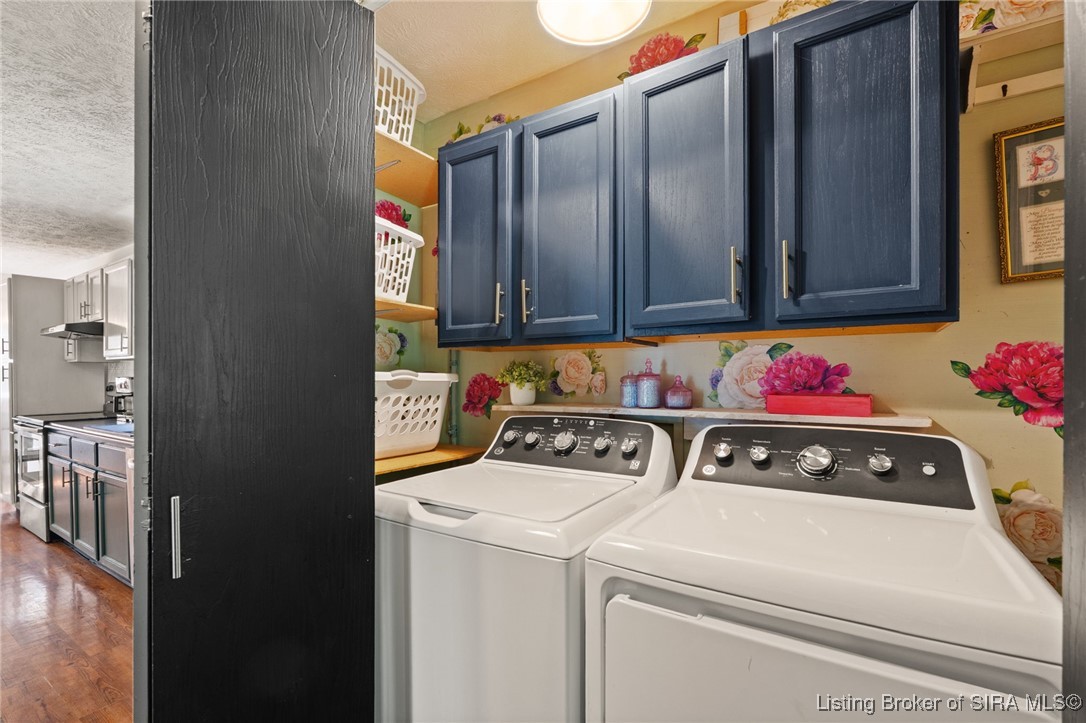 1070 Jacobs Lane Southwest Central, IN 47110 - Photo 12 of 64 Laundry room with plenty of storage space off kitchen