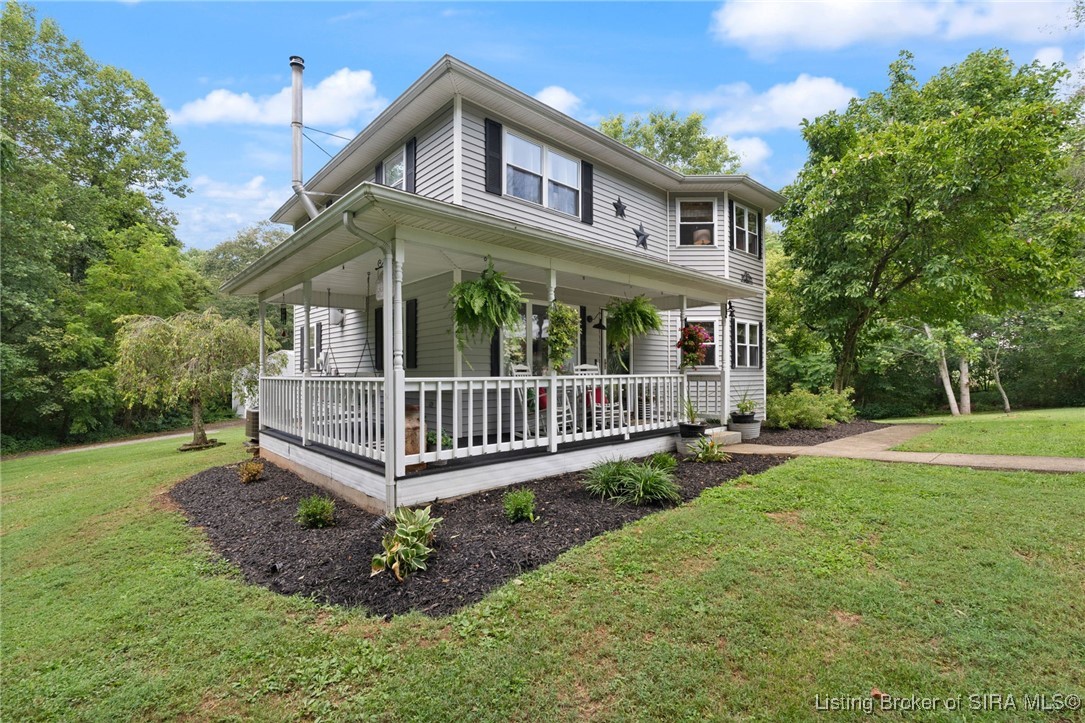 1070 Jacobs Lane Southwest Central, IN 47110 - Photo 20 of 64 Enjoy the covered porch.