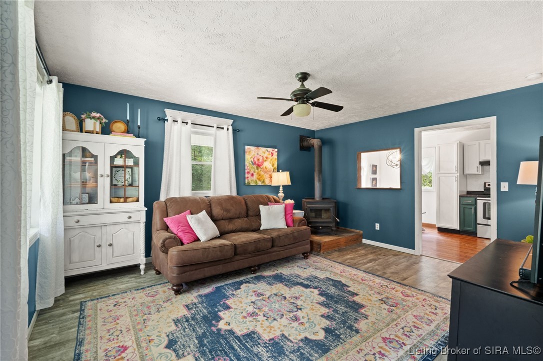 1070 Jacobs Lane Southwest Central, IN 47110 - Photo 2 of 64 Cozy living room with wood burning stove!