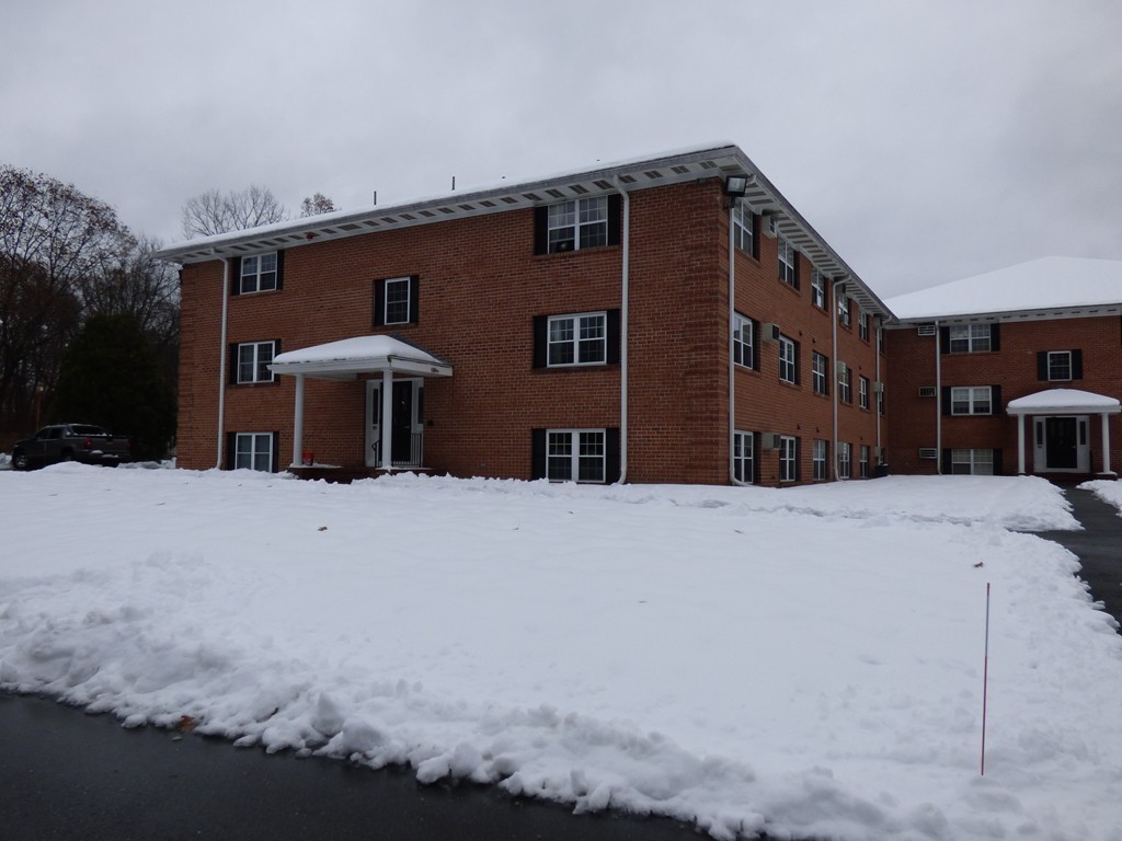 2 Leonard Road, Unit 2 Boxborough, MA 01719 - Photo 17 of 17 a front view of a house with a yard